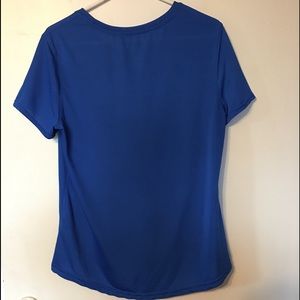 Danskin women’s Blue Now semi fit Shirt.